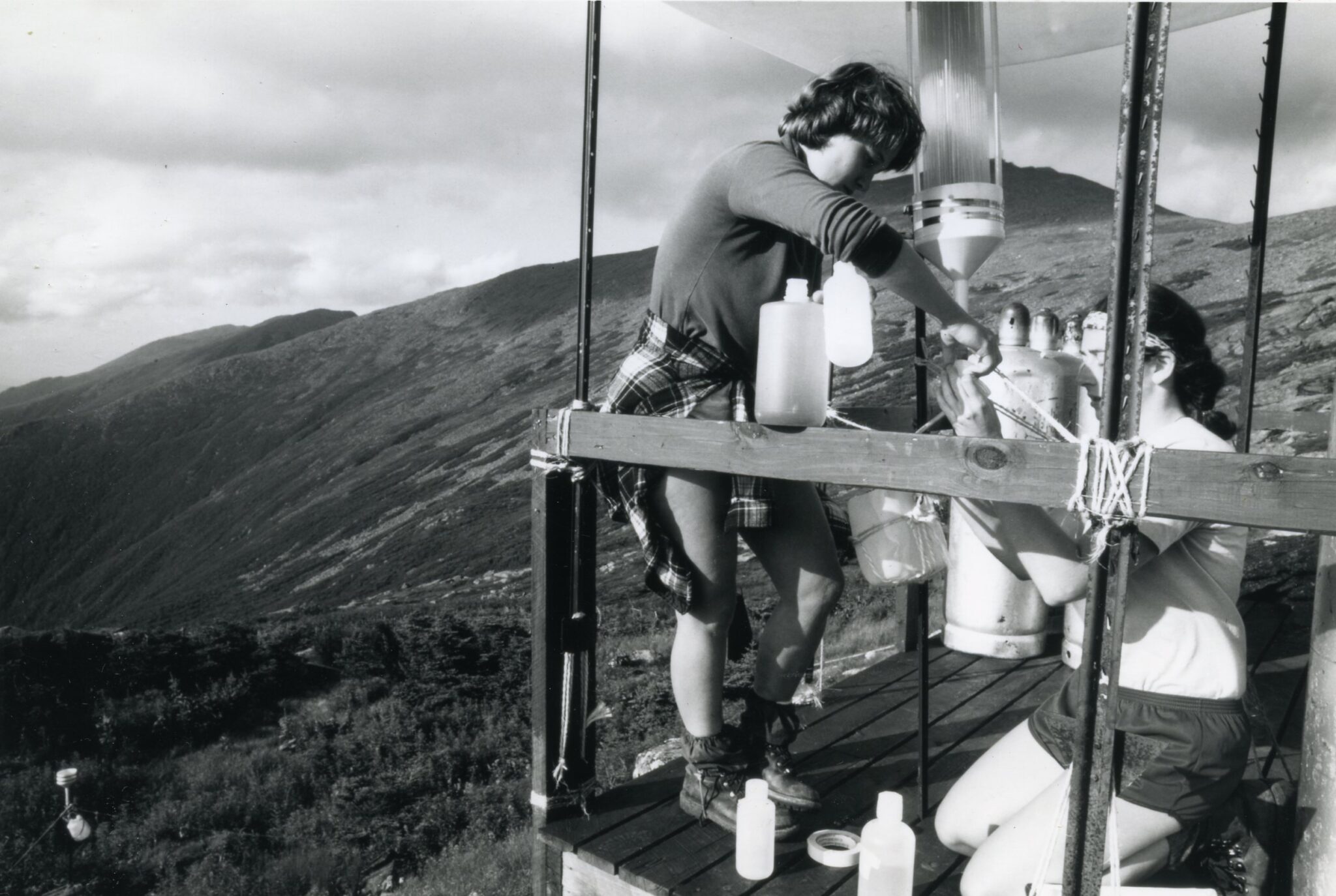 AMC ArchivesAMC has been monitoring climate change in the White Mountains for decades. In this photo from the 1980s, a research assistant measures air quality at Lakes of the Clouds Hut.